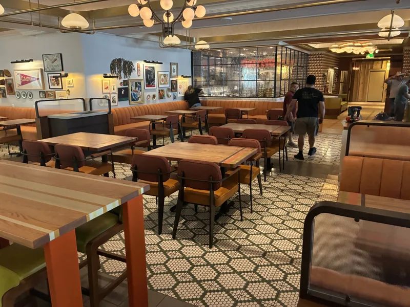 A view across the upholstered seating and dining tables at Birdie G's.